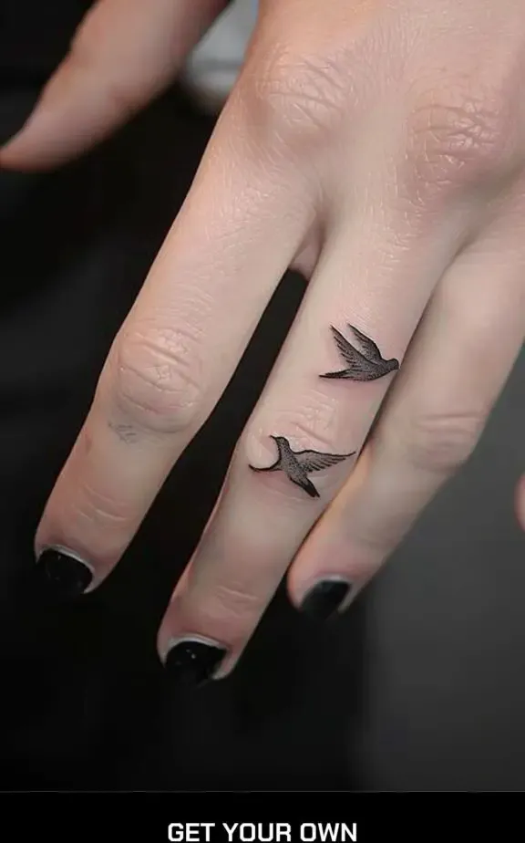tiny birds finger tattoo