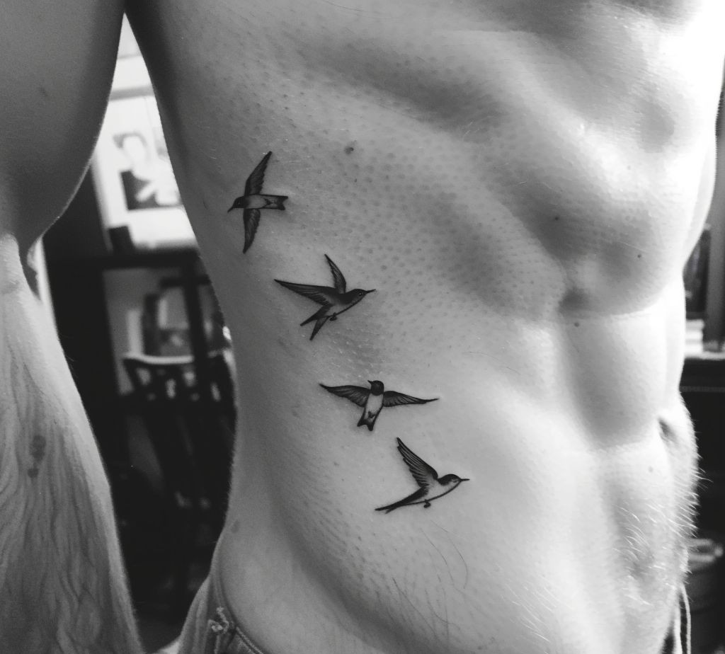 rib tattoo ideas for guys