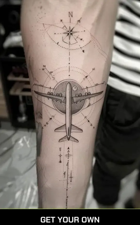 compass and airplane tattoo