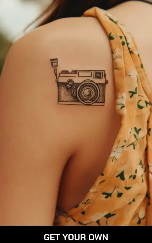 small beautiful tattoo idea for ladies: camera and paint brush