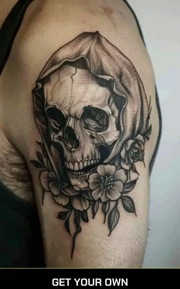 skull and flower blackwork tattoo idea