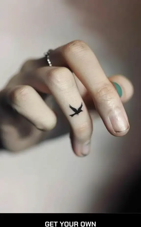 cute bird finger tattoo 