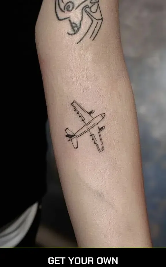 minimalist airplane tattoo