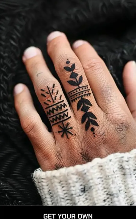 tribal pattern finger tattoo for men