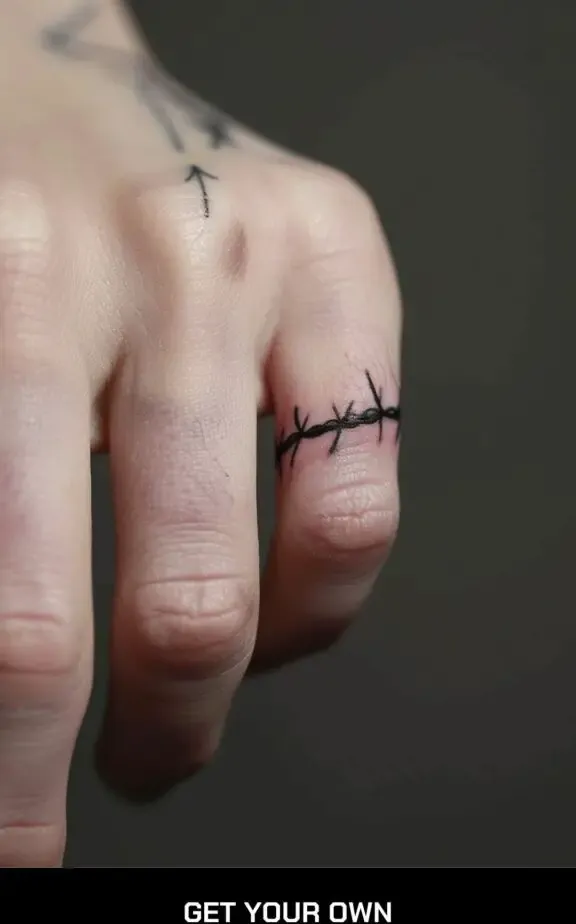 barbed wire finger tattoo