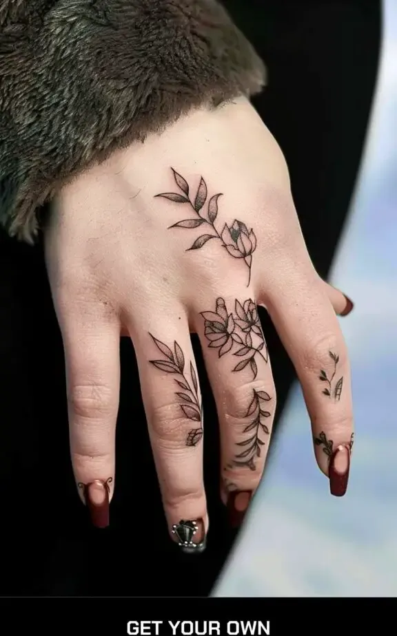 cool floral tattoo on the finger