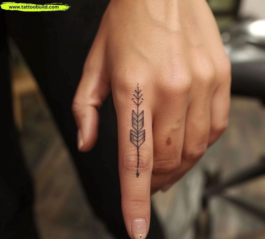 arrow finger tattoo