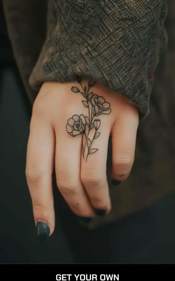 finger floral tattoo
