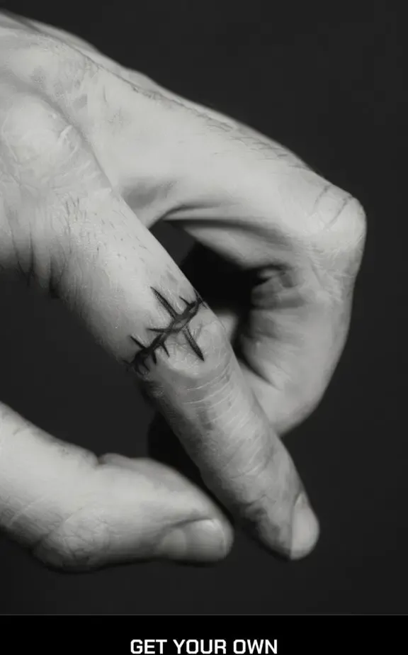 barbed wire finger tattoo design