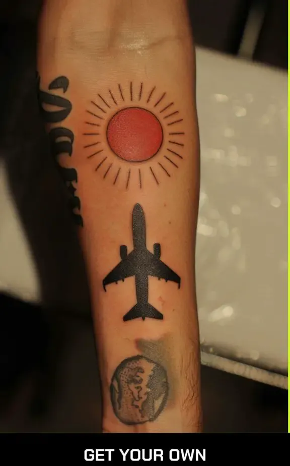 airplane and sun travel tattoo idea