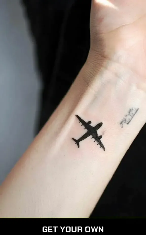 silhouette airplane tattoo