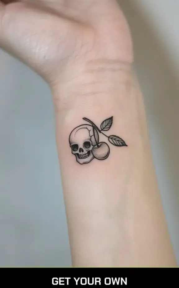 minimalist cherry and skull tattoo