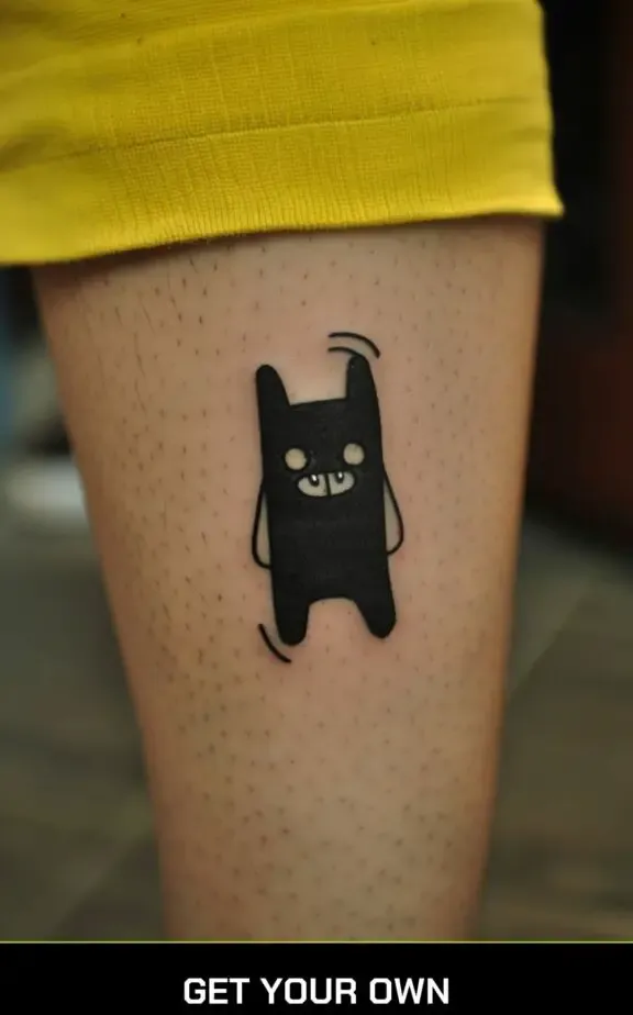 a tattoo of fin & jake from Adventure Time