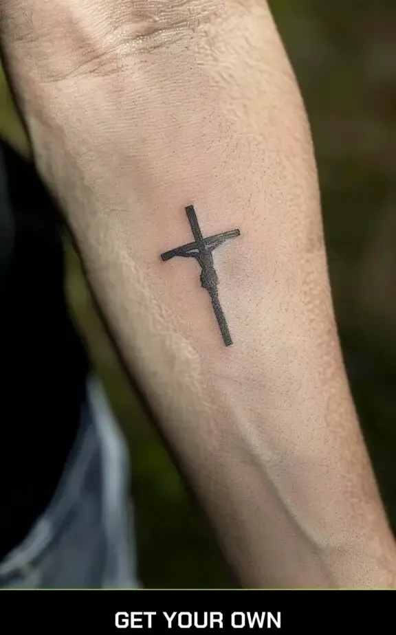 small tattoo designs for men: crucifix tattoo