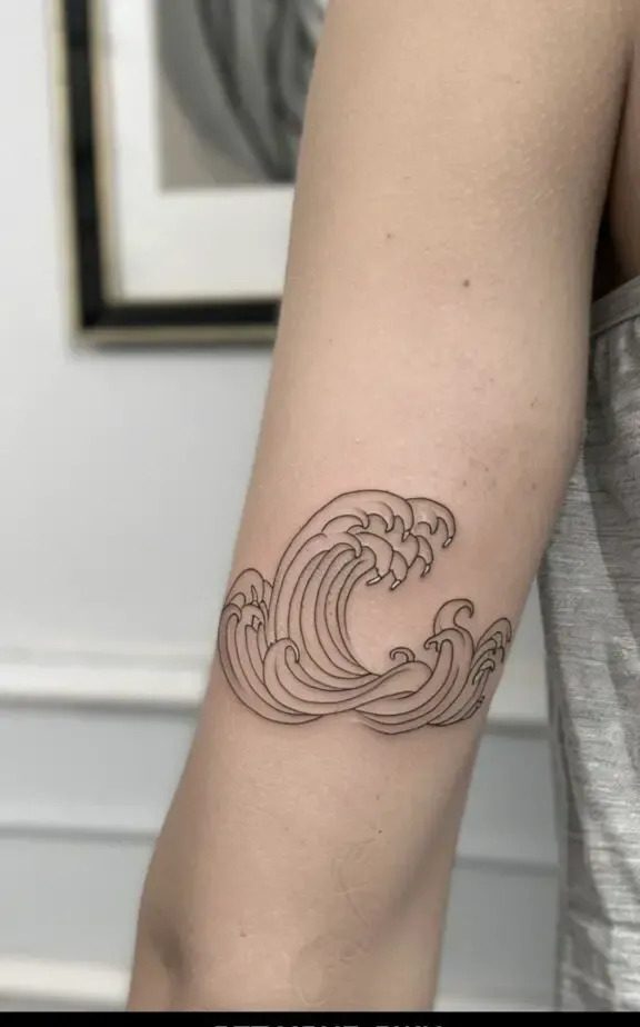 Womens tattoo back of the arm