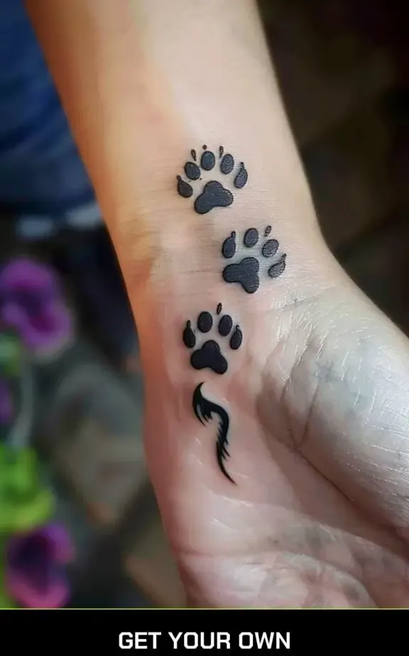 cat paw trail tattoo