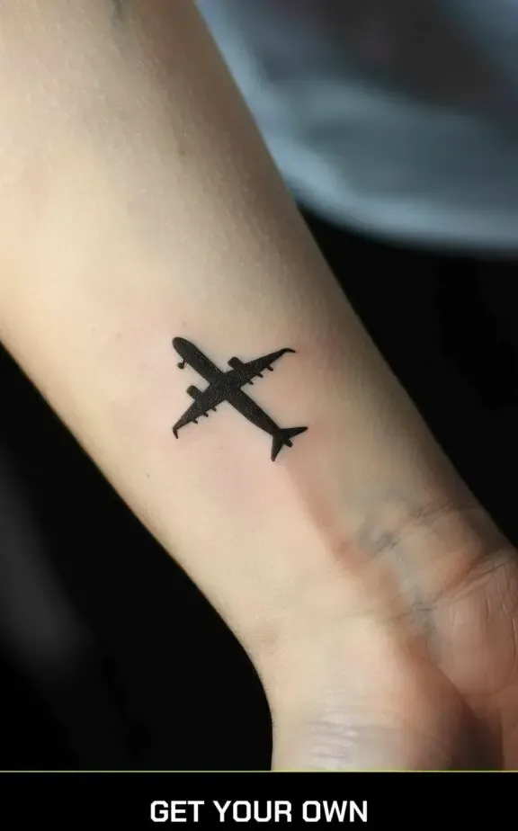 silhouette airplane tattoo idea