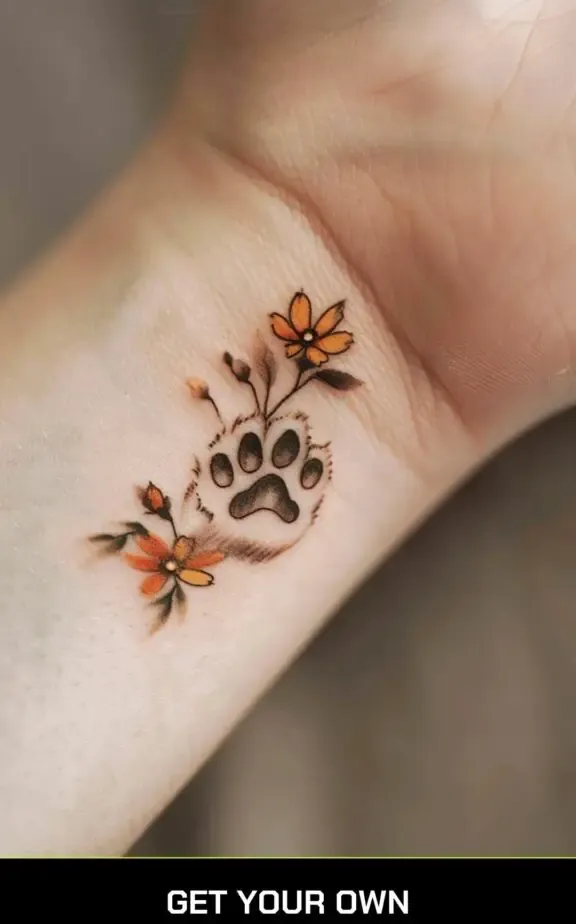cat paw and flower tattoo