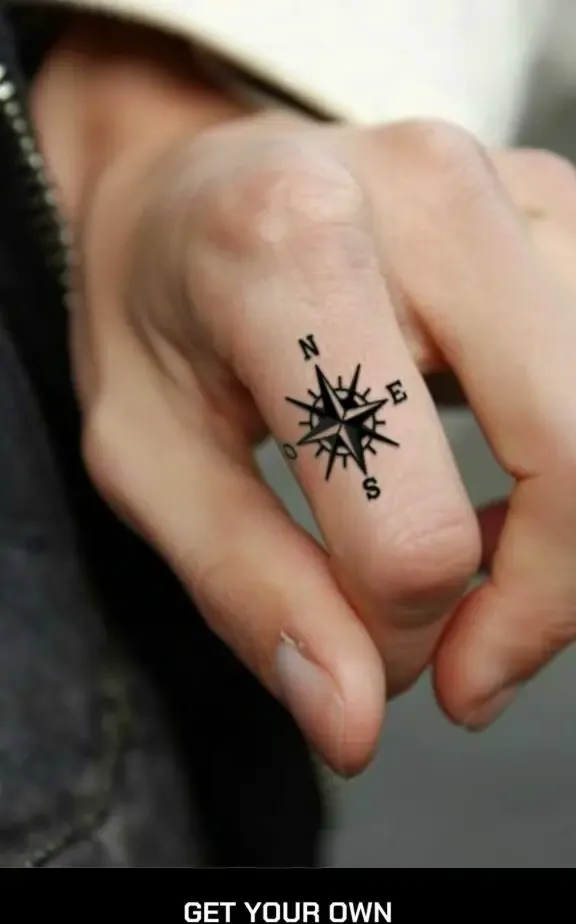 finger compass tattoo