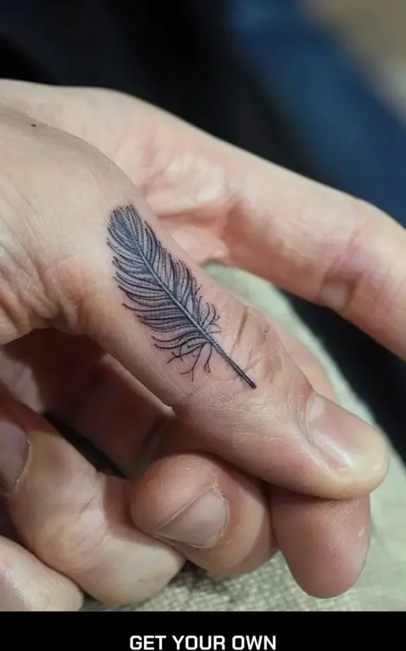 feather finger tattoo