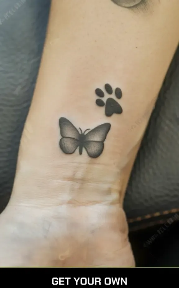 butterfly and cat paw tattoo