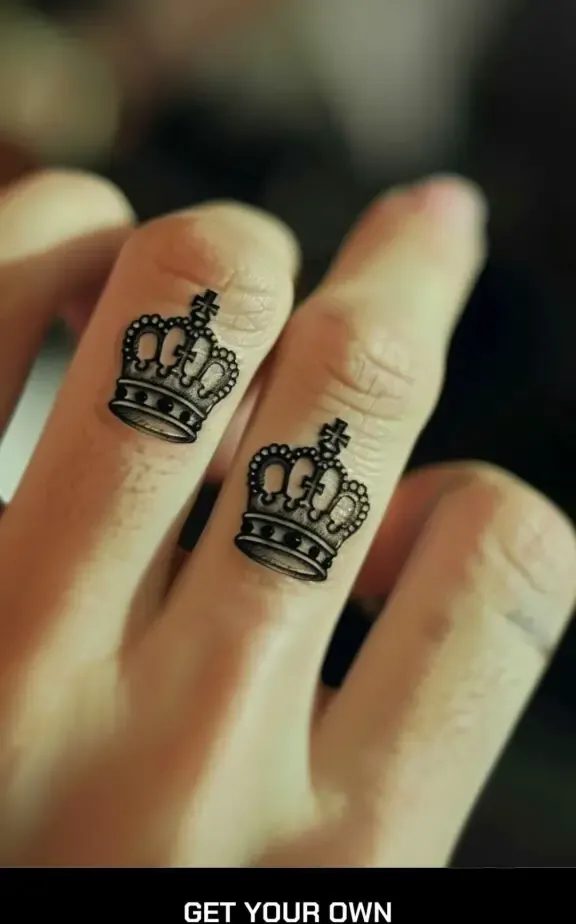 crown finger tattoo